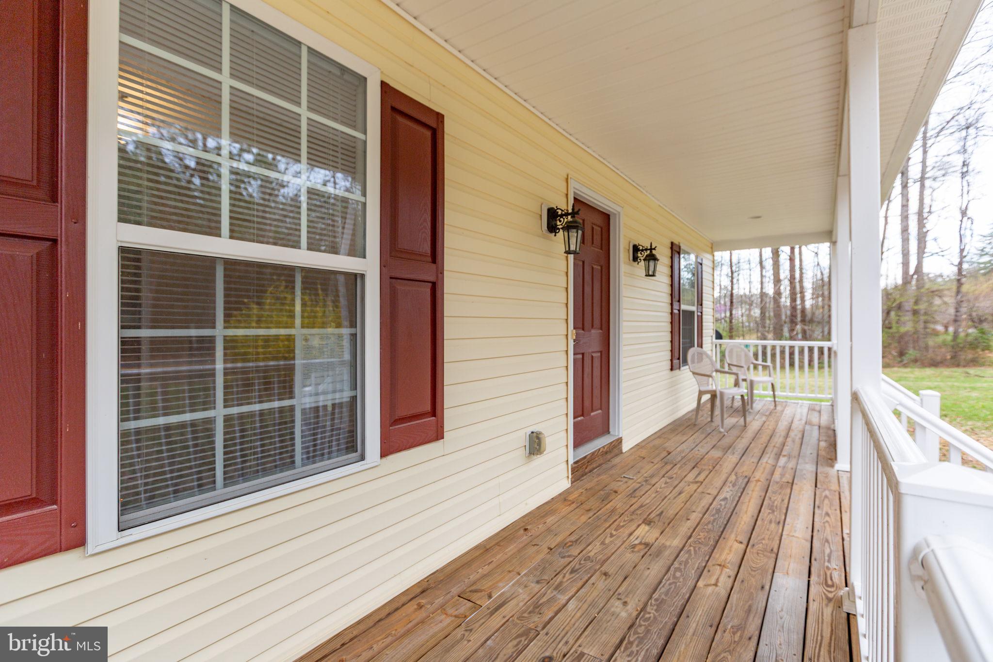 8401 Seays Road Spotsylvania, VA 22551 - Photo 4 of 32 Rocking chair front porch space