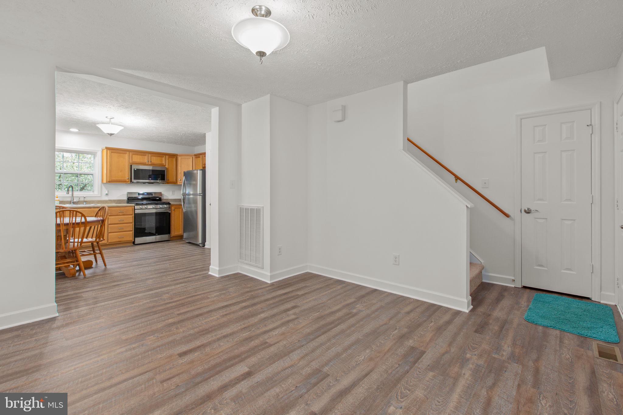 8401 Seays Road Spotsylvania, VA 22551 - Photo 7 of 32 LVP floors and right off of the kitchen/dining