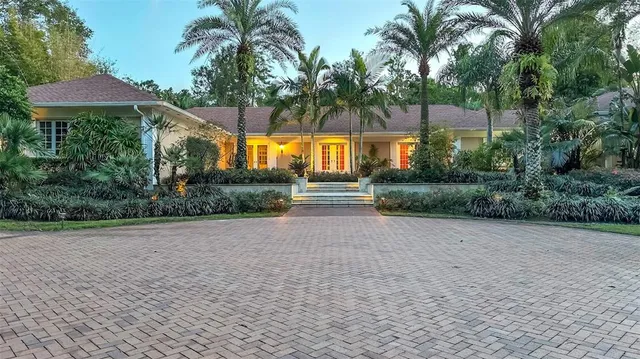 a backyard of a house with lots of green space