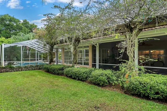 a kitchen with kitchen island granite countertop a sink stainless steel appliances and cabinets