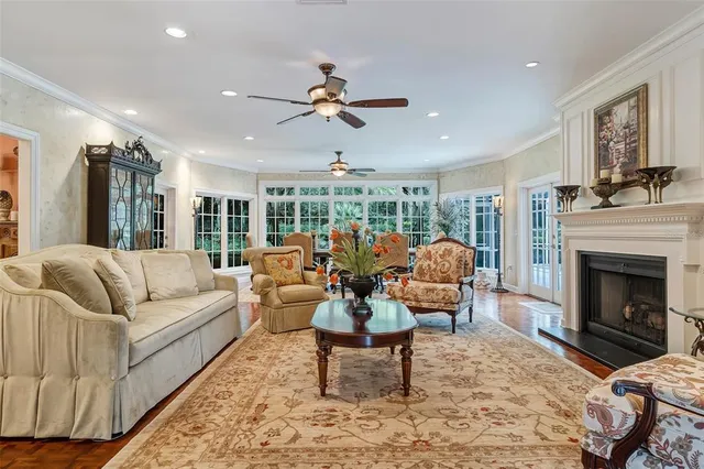 a spacious bedroom with a large bed and a large window