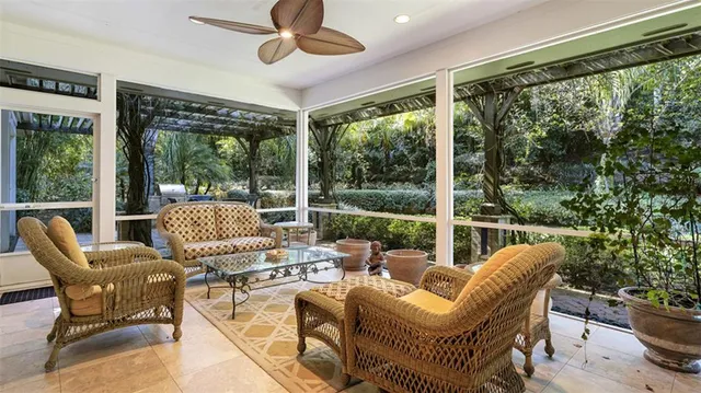 an aerial view of a house with garden space and a street view