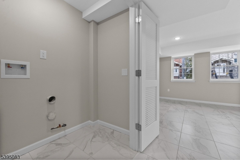 24 Garibaldi Avenue Newark, NJ 07114 - Photo 10 of 13 a view of an empty room