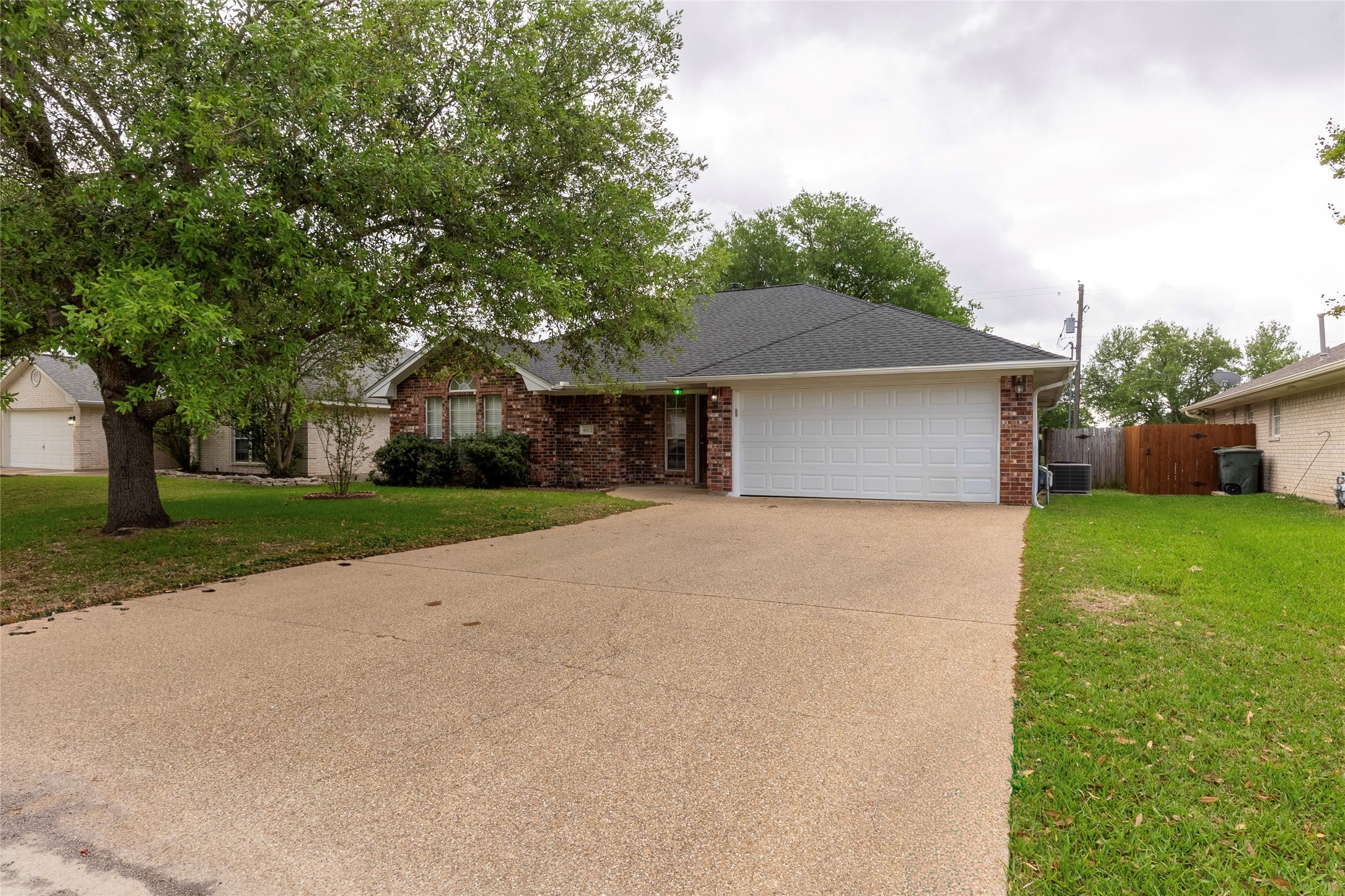 4802 Treadgold Lane Bryan, TX 77802 - Photo 4 of 27 a front view of house with a garden