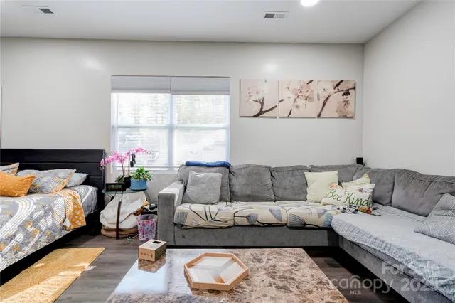 a living room with furniture and a couch
