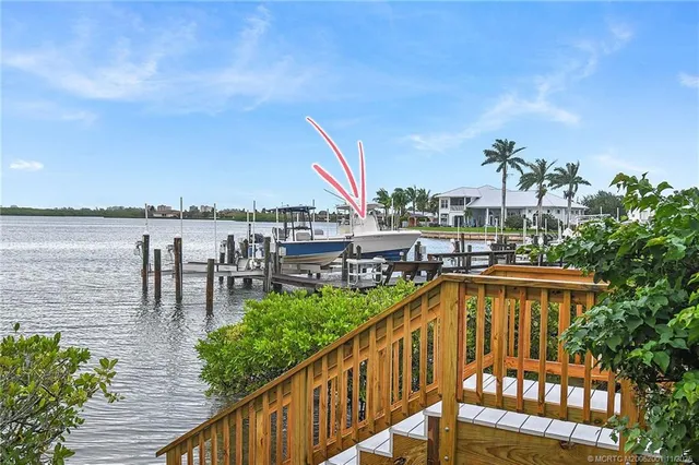 a view of swimming pool with outdoor seating