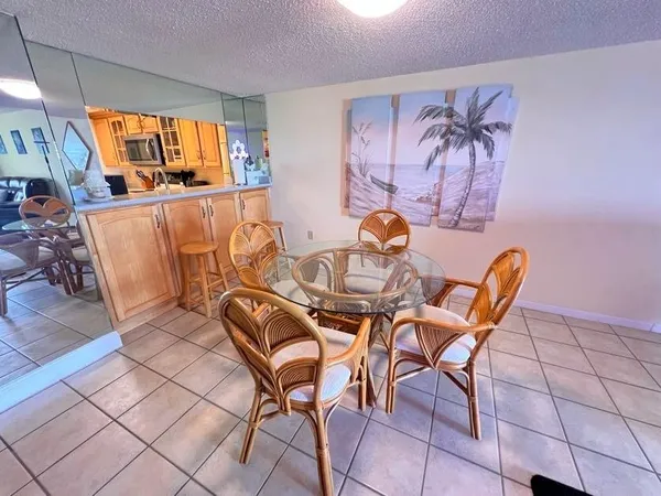 a kitchen with a sink stove and microwave