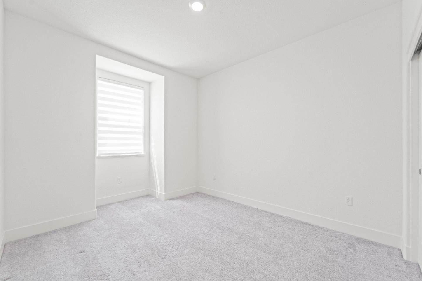384 Ramos Ranch Road Oakley, CA 94561 - Photo 31 of 39 an empty room with a window