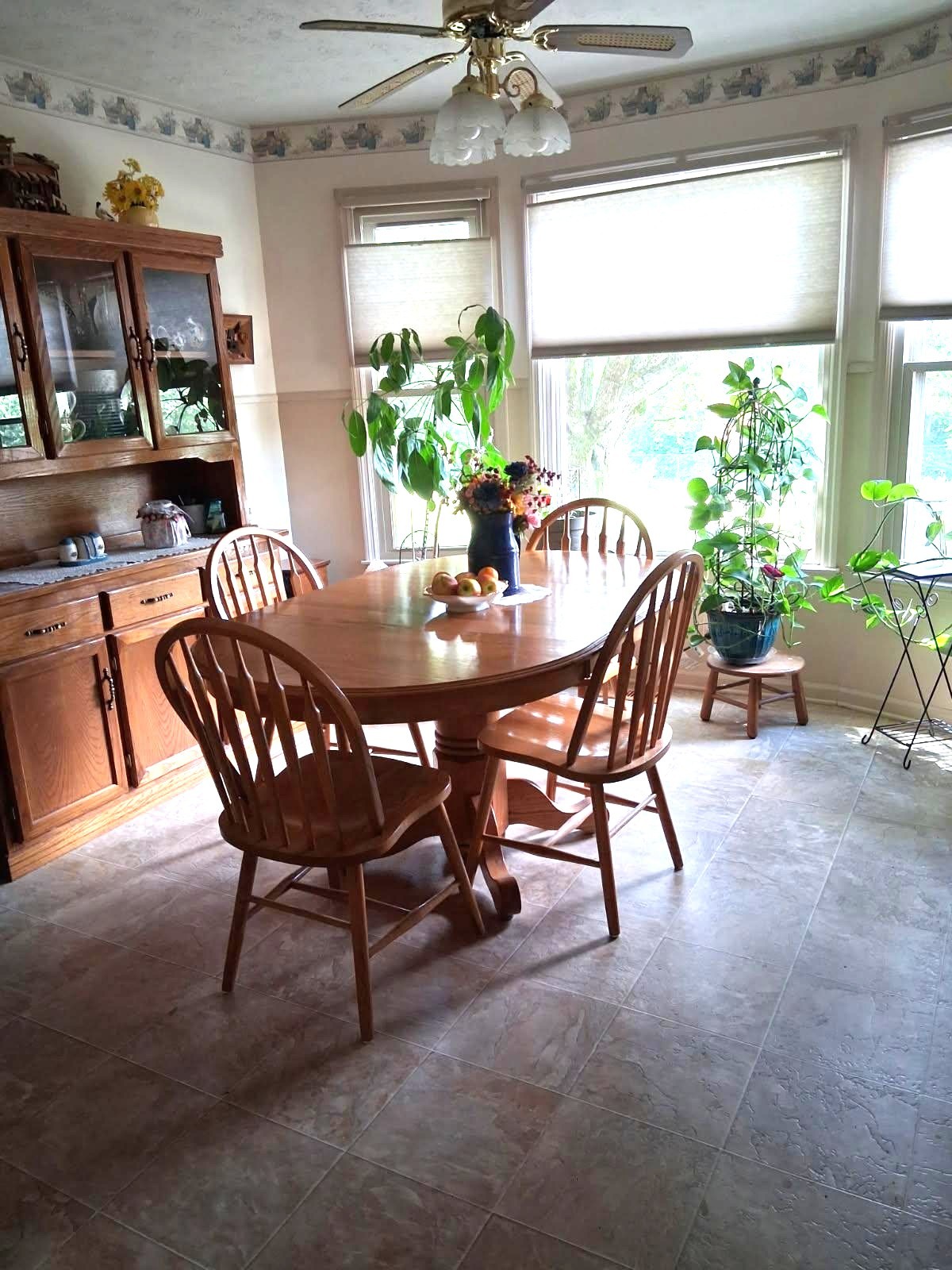 3168 Maxey Road Cedar Hill, TN 37032 - Photo 28 of 40 a dining room with furniture a large window and wooden floor