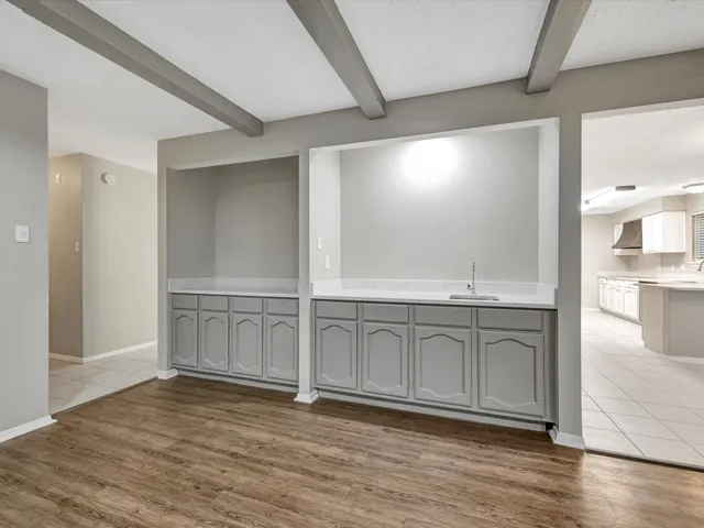 a view of a livingroom with wooden floor