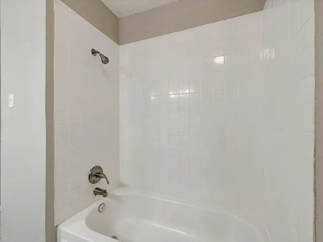 a bathroom with a bathtub