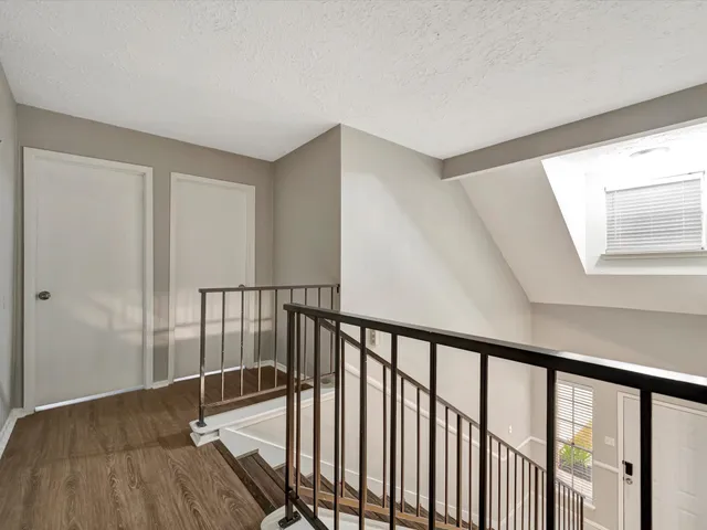 a view of entryway with wooden floor
