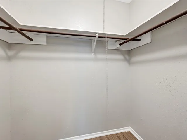 a view of a room with racks on the wall