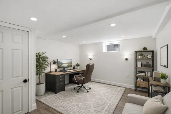 a workspace with furniture and wooden floor