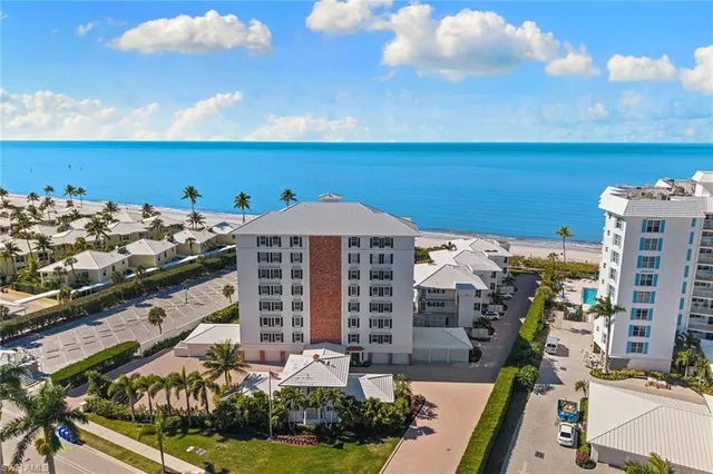 a roof deck view with tall buildings