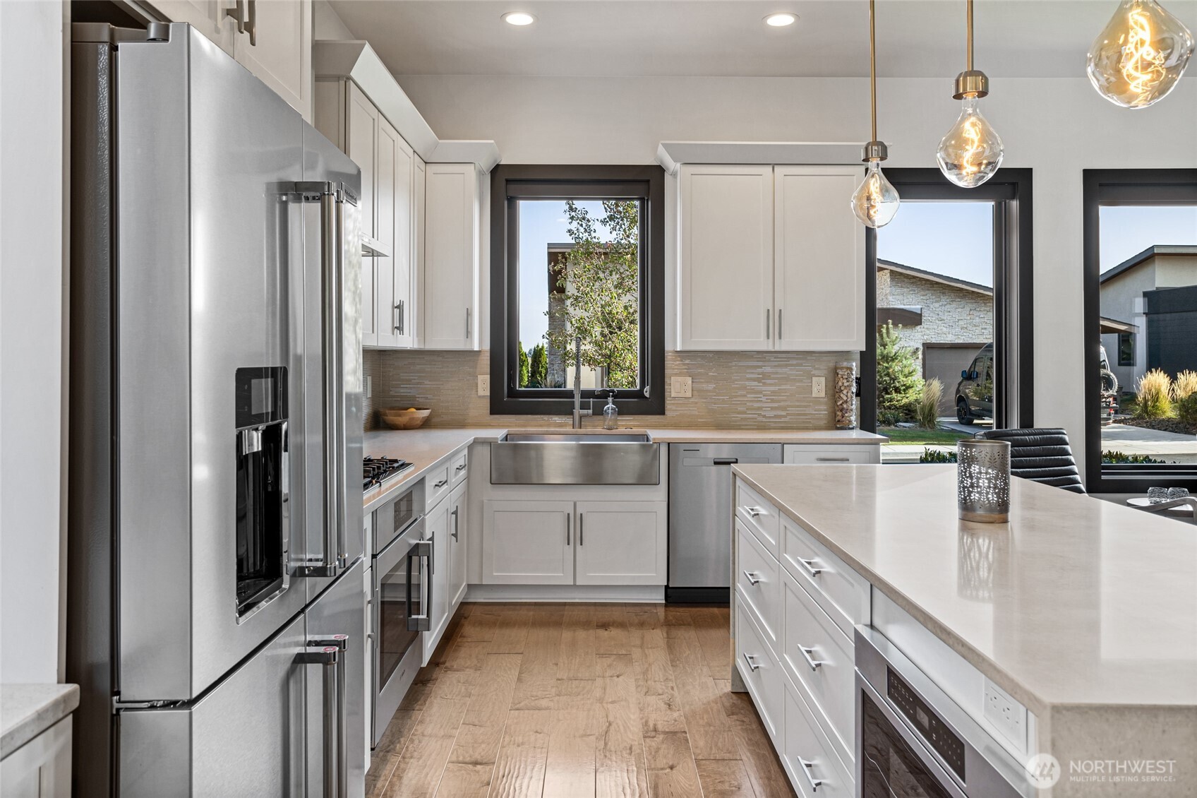 4305 Catalyss Way Yakima, WA 98908 - Photo 11 of 35 a kitchen with a sink cabinets and window
