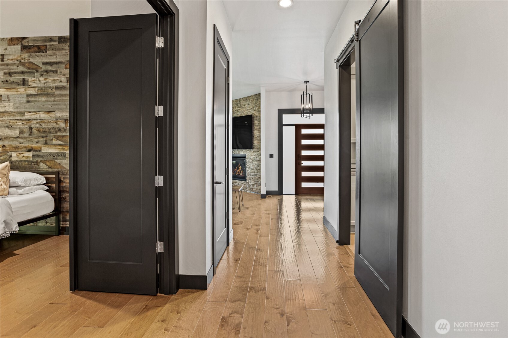 4305 Catalyss Way Yakima, WA 98908 - Photo 20 of 35 a view of a hallway with wooden floor and living room