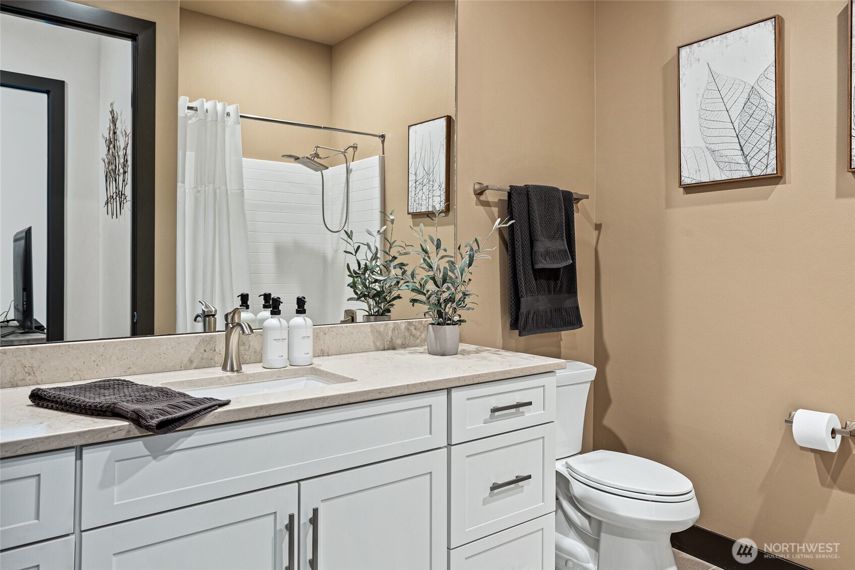 4305 Catalyss Way Yakima, WA 98908 - Photo 30 of 35 a bathroom with a granite countertop sink toilet and mirror