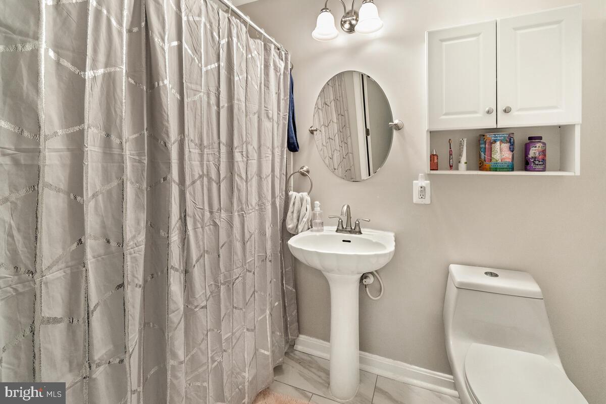 14913 Cleese Court, Unit 4AB Silver Spring, MD 20906 - Photo 22 of 30 Hall bath 2