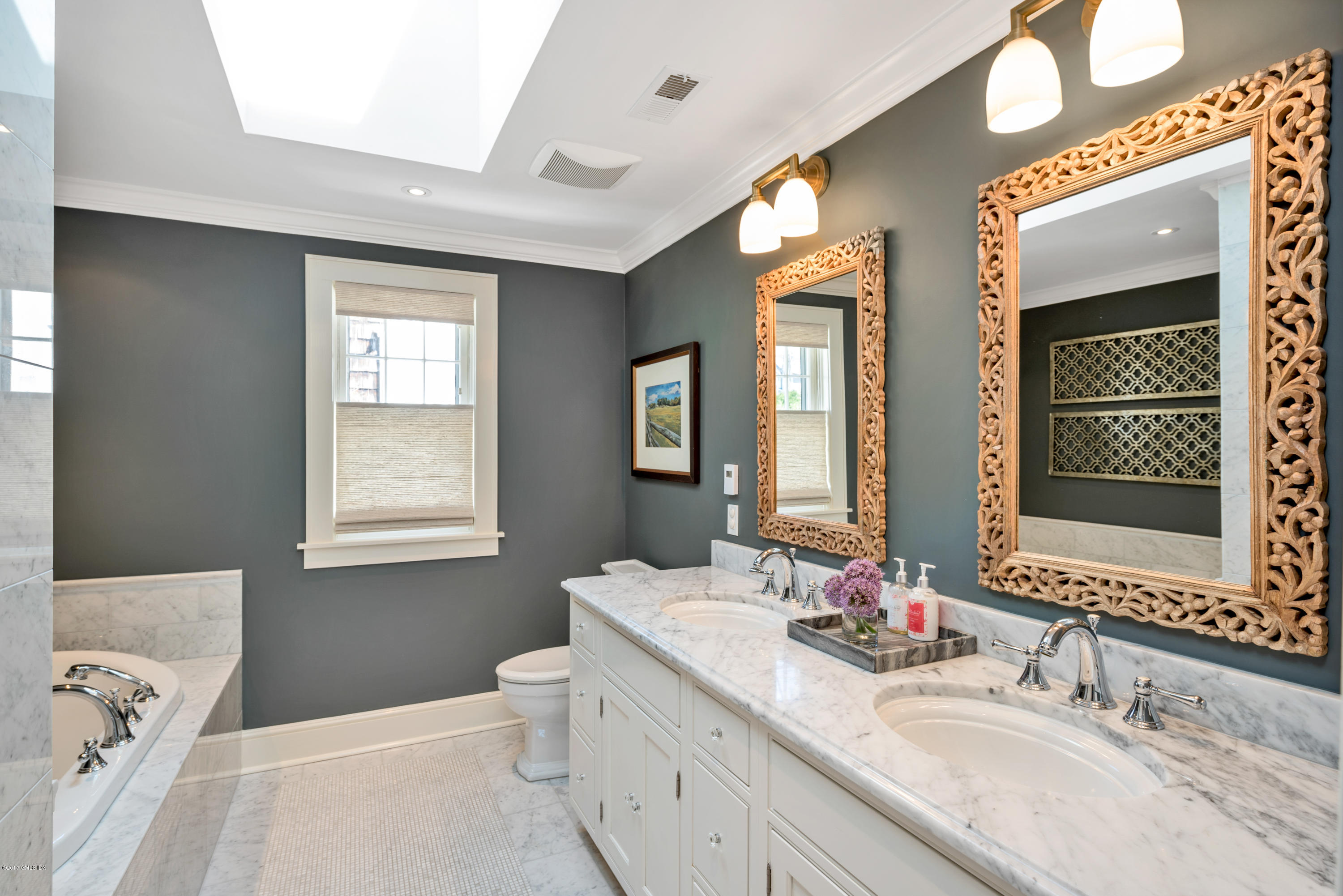 76 Valleywood Road Cos Cob, CT 06830 - Photo 13 of 24 a bathroom with a granite countertop sink mirror and a bathtub