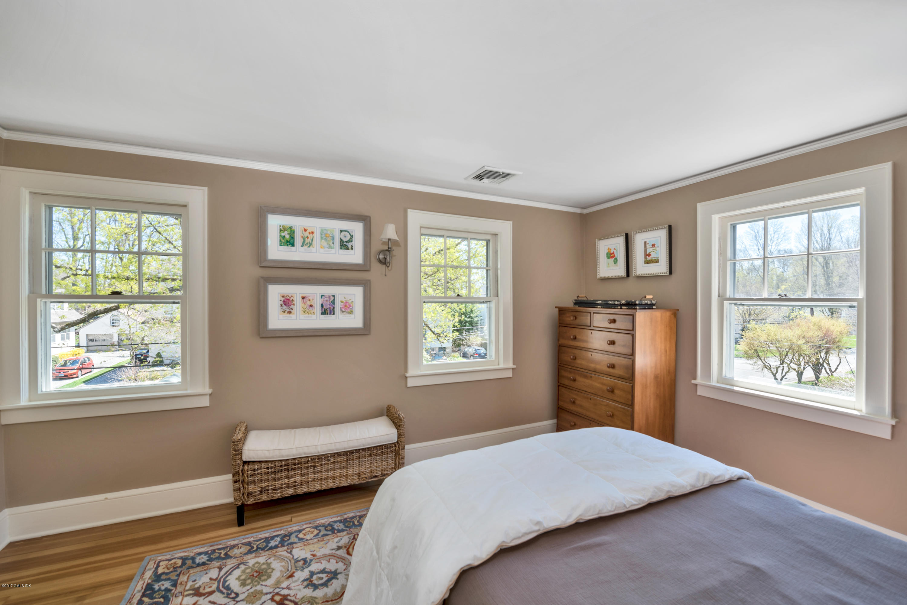 76 Valleywood Road Cos Cob, CT 06830 - Photo 14 of 24 a bedroom with a bed dresser and a window