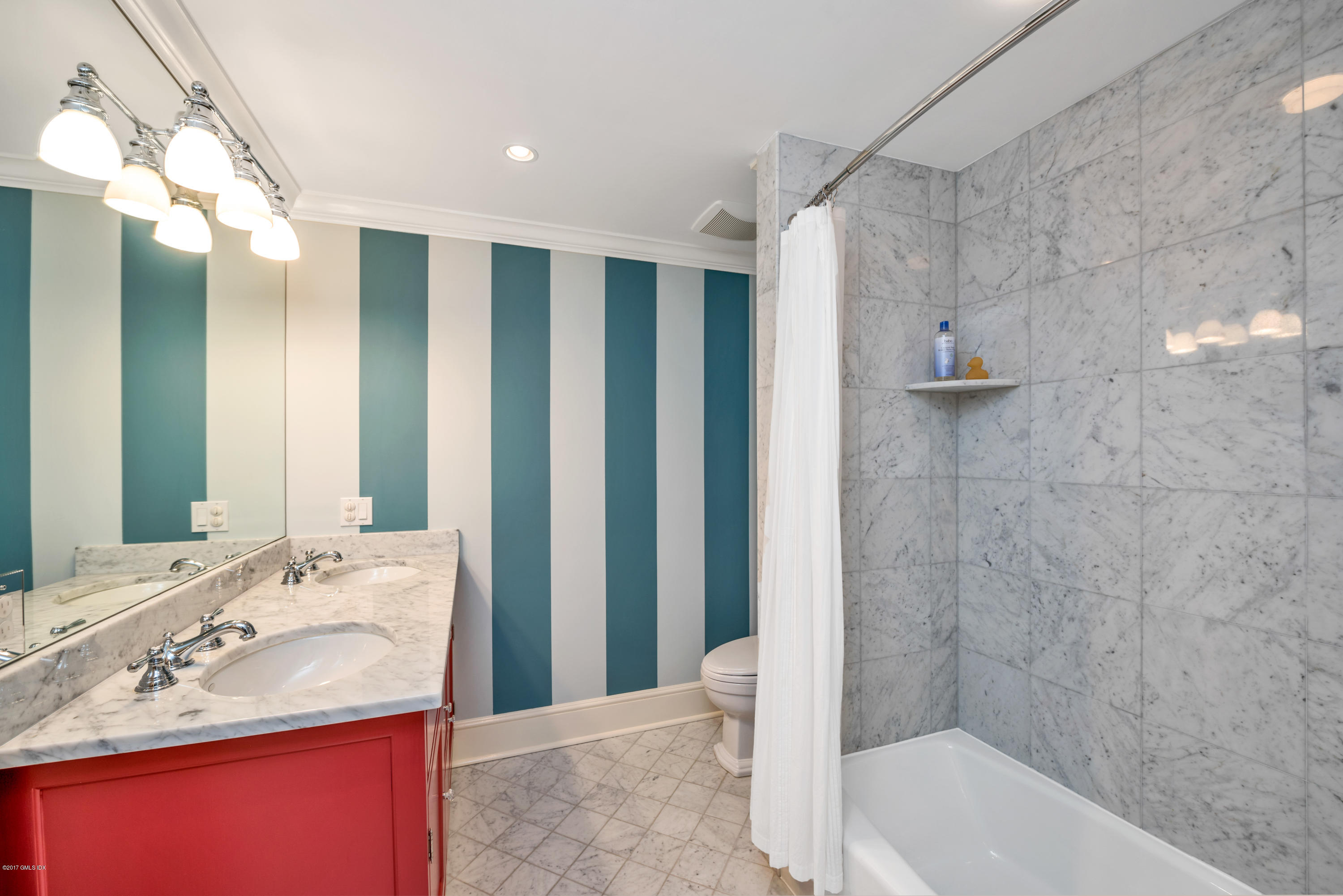 76 Valleywood Road Cos Cob, CT 06830 - Photo 17 of 24 a bathroom with a granite countertop sink and a mirror