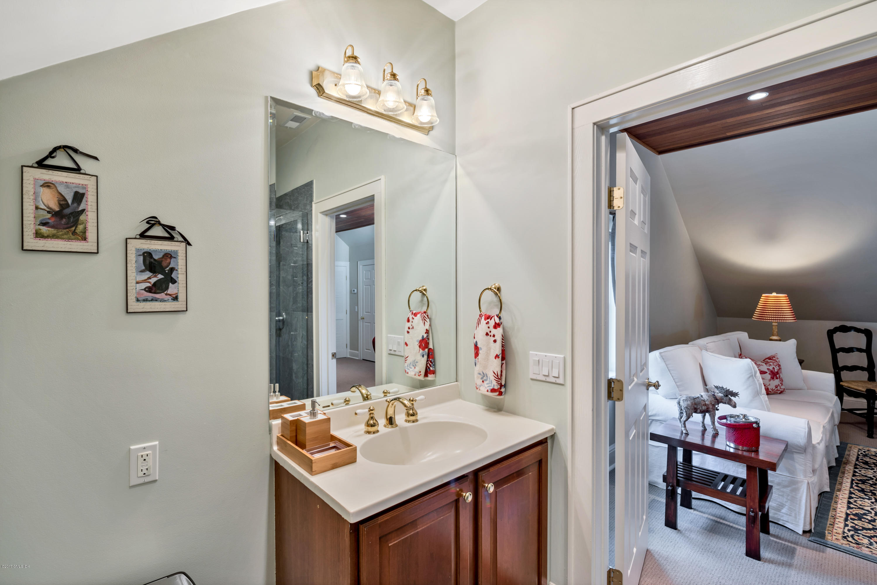 76 Valleywood Road Cos Cob, CT 06830 - Photo 22 of 24 a bathroom with a sink vanity and a mirror