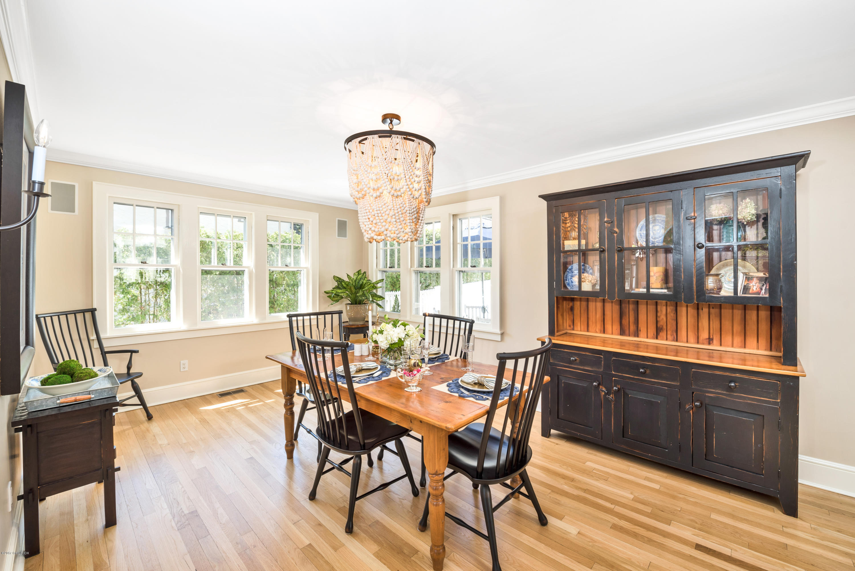 76 Valleywood Road Cos Cob, CT 06830 - Photo 6 of 24 a view of a dining room with furniture window and wooden floor