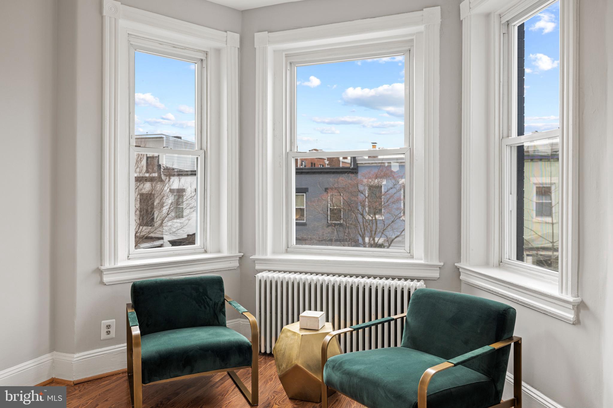 2219 Flagler Place Northwest Washington, DC 20001 - Photo 17 of 31 a view of a chair and table in a living room
