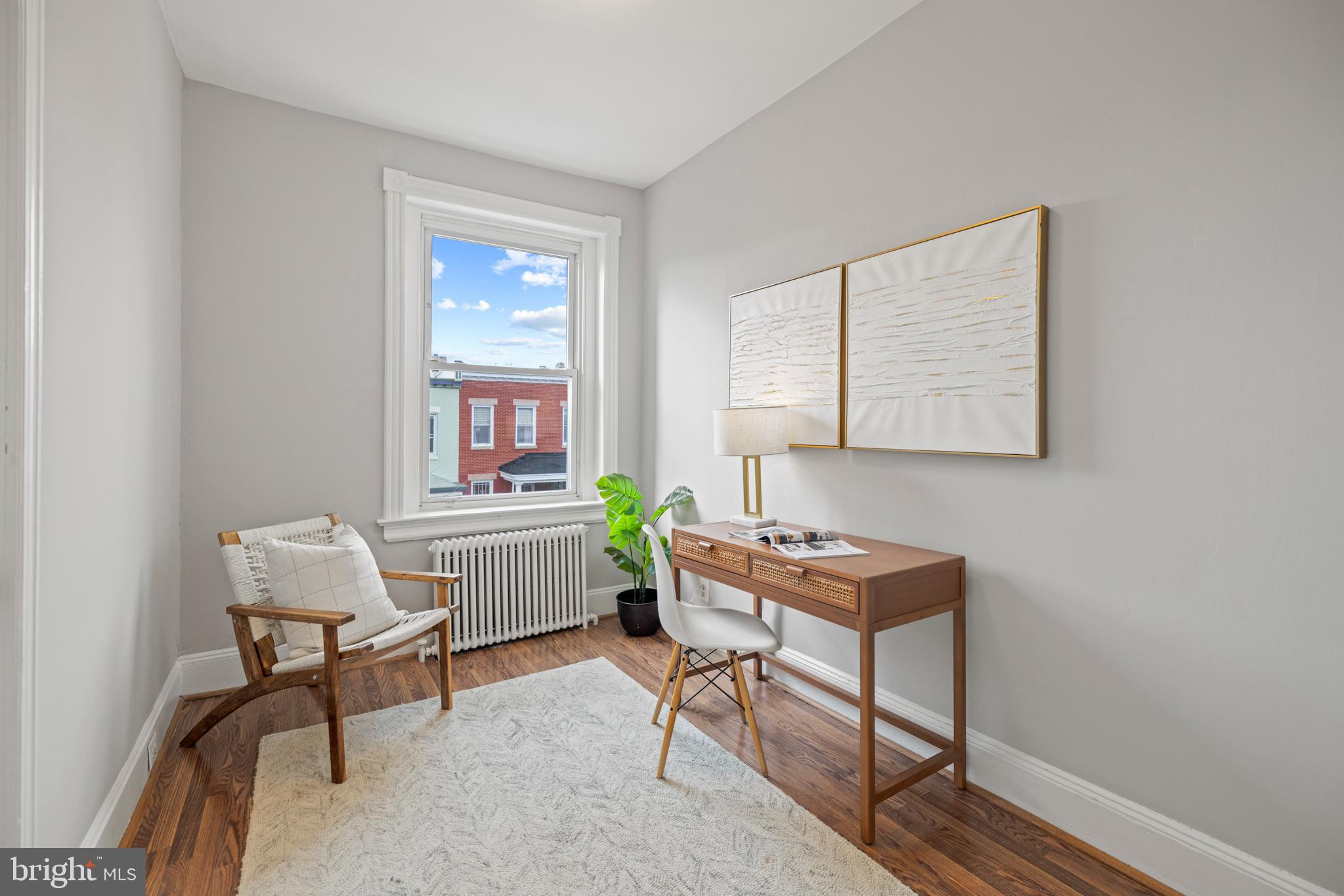 2219 Flagler Place Northwest Washington, DC 20001 - Photo 18 of 31 a room with furniture and a window