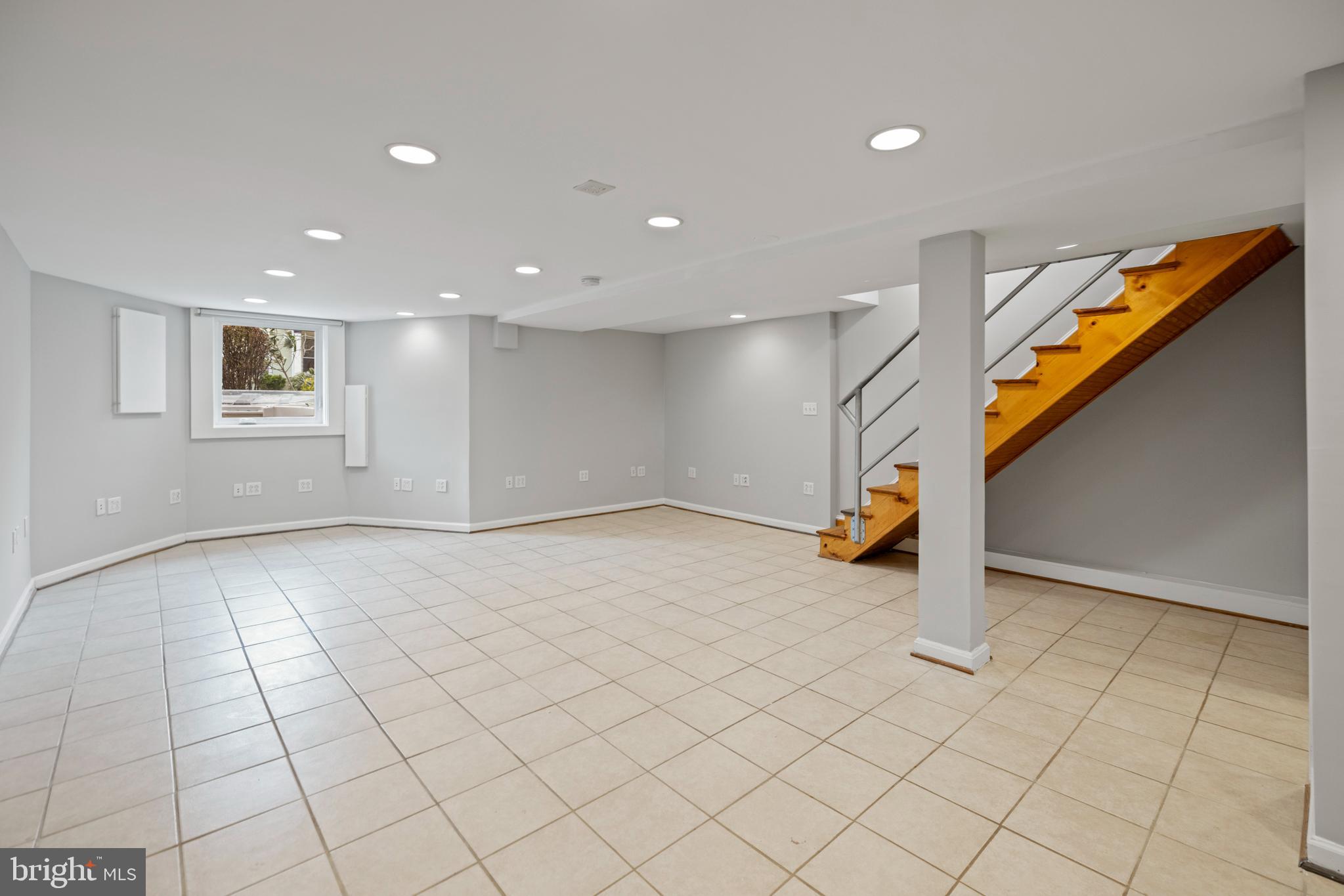 2219 Flagler Place Northwest Washington, DC 20001 - Photo 22 of 31 a view of an empty room and stairs