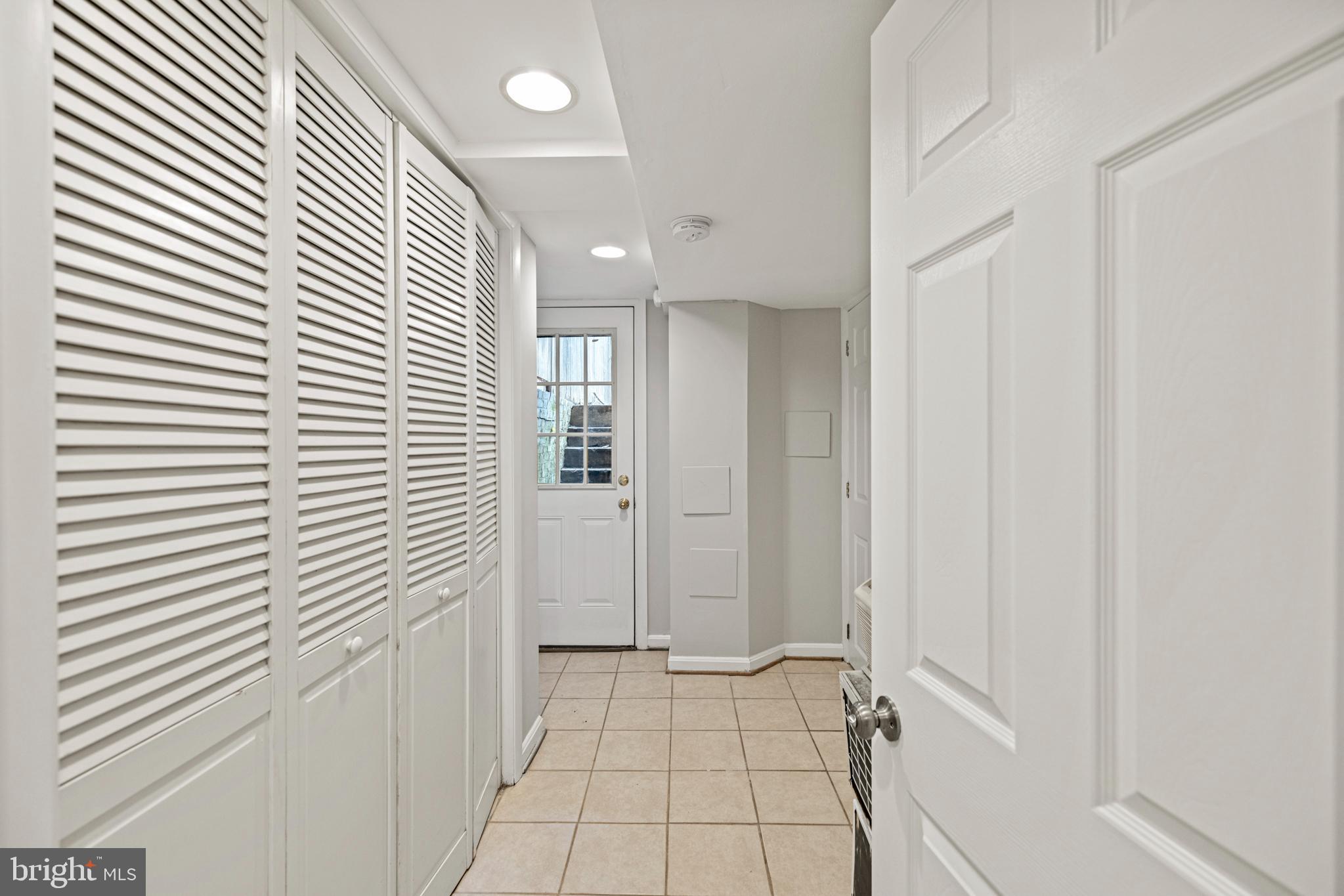 2219 Flagler Place Northwest Washington, DC 20001 - Photo 24 of 31 a view of an empty room and a window