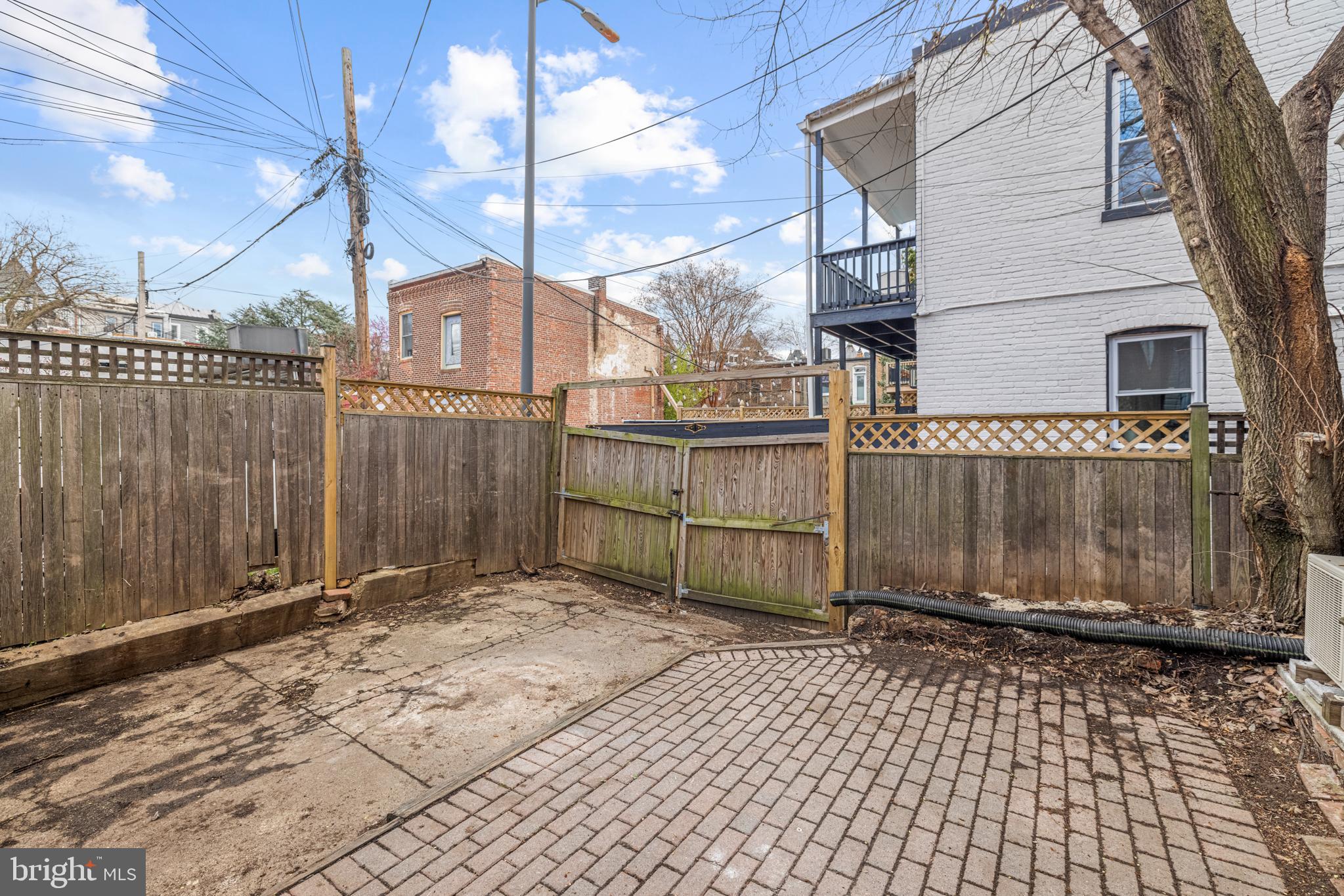 2219 Flagler Place Northwest Washington, DC 20001 - Photo 27 of 31 a view of a house with a backyard