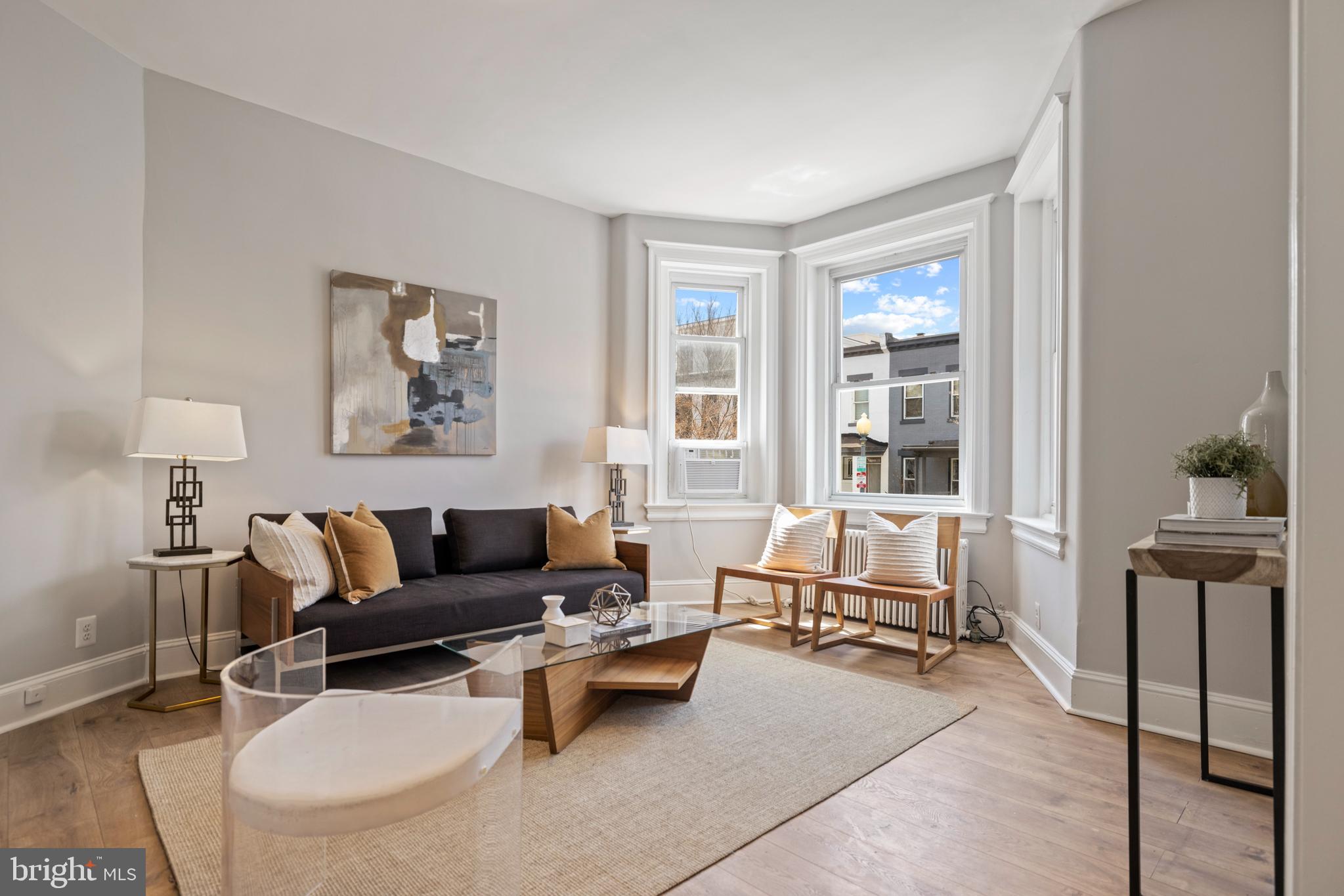 2219 Flagler Place Northwest Washington, DC 20001 - Photo 5 of 31 a living room with furniture and a potted plant on table