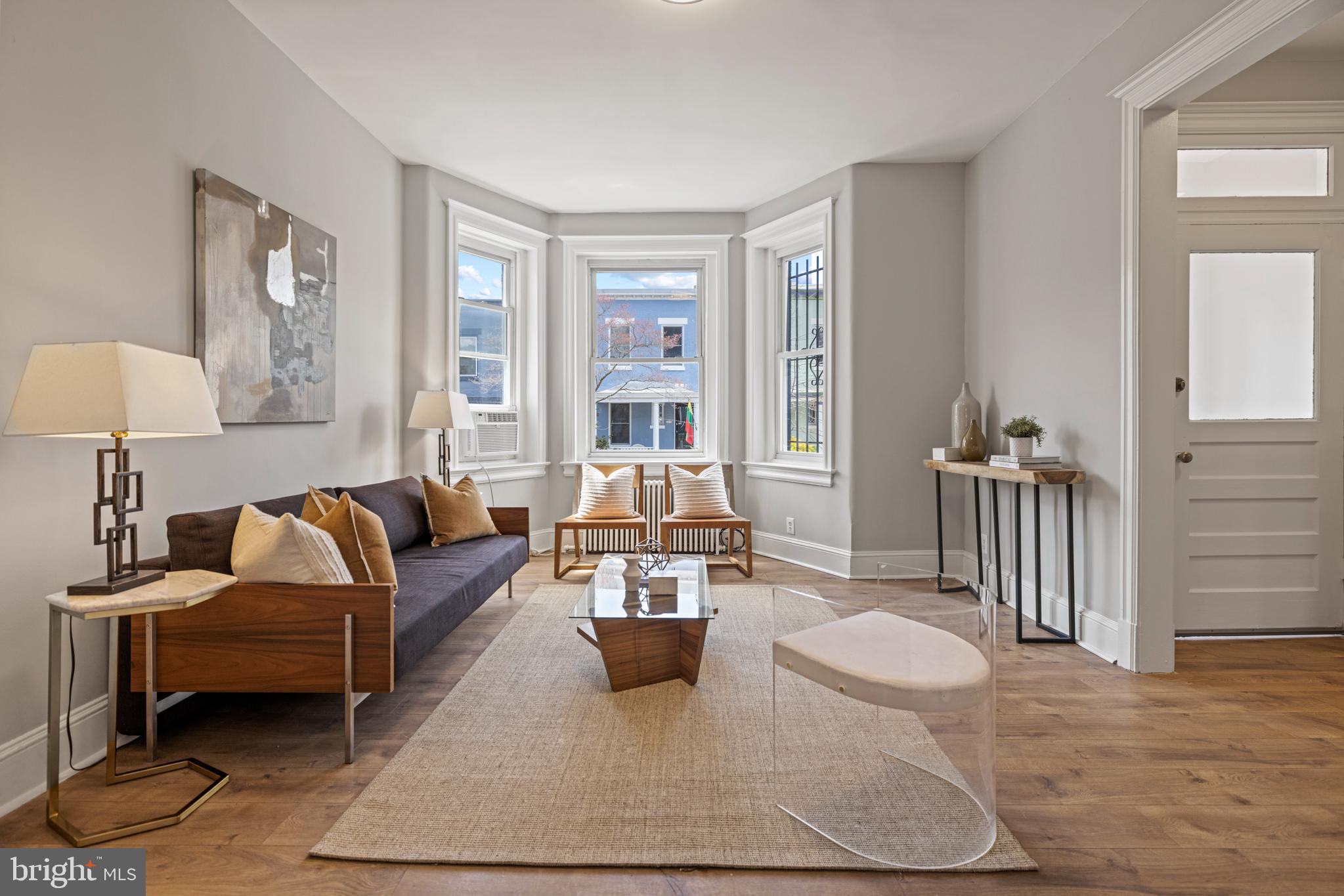 2219 Flagler Place Northwest Washington, DC 20001 - Photo 6 of 31 a living room with furniture and wooden floor