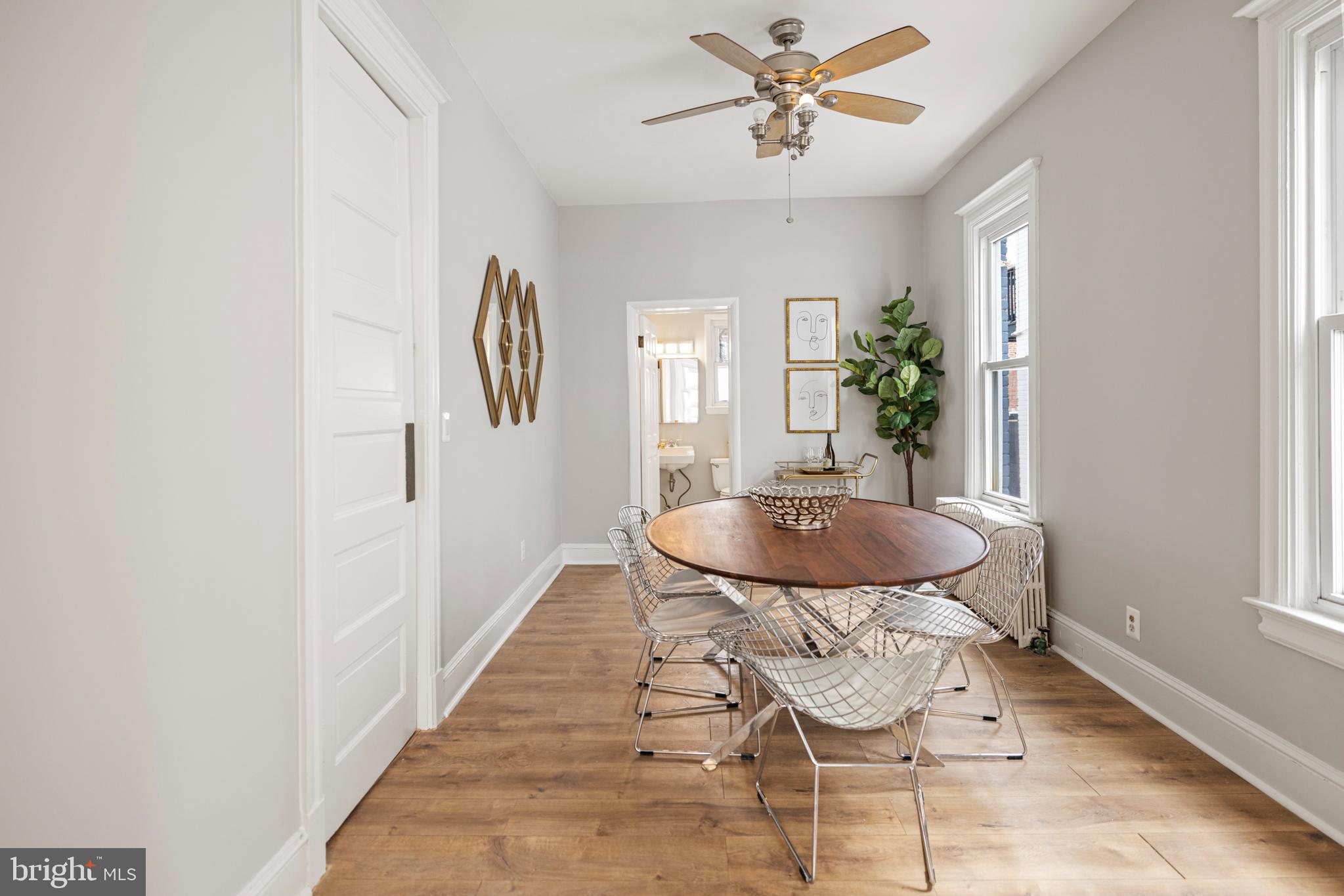 2219 Flagler Place Northwest Washington, DC 20001 - Photo 7 of 31 a view of a dining room with furniture and a window