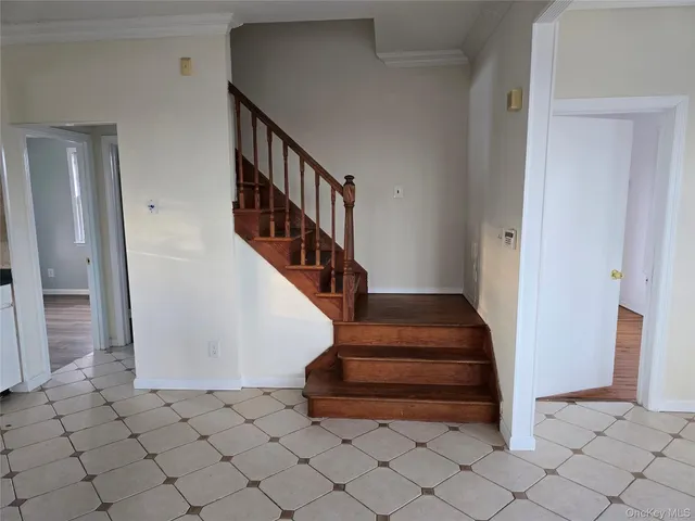a view of entryway with a front door