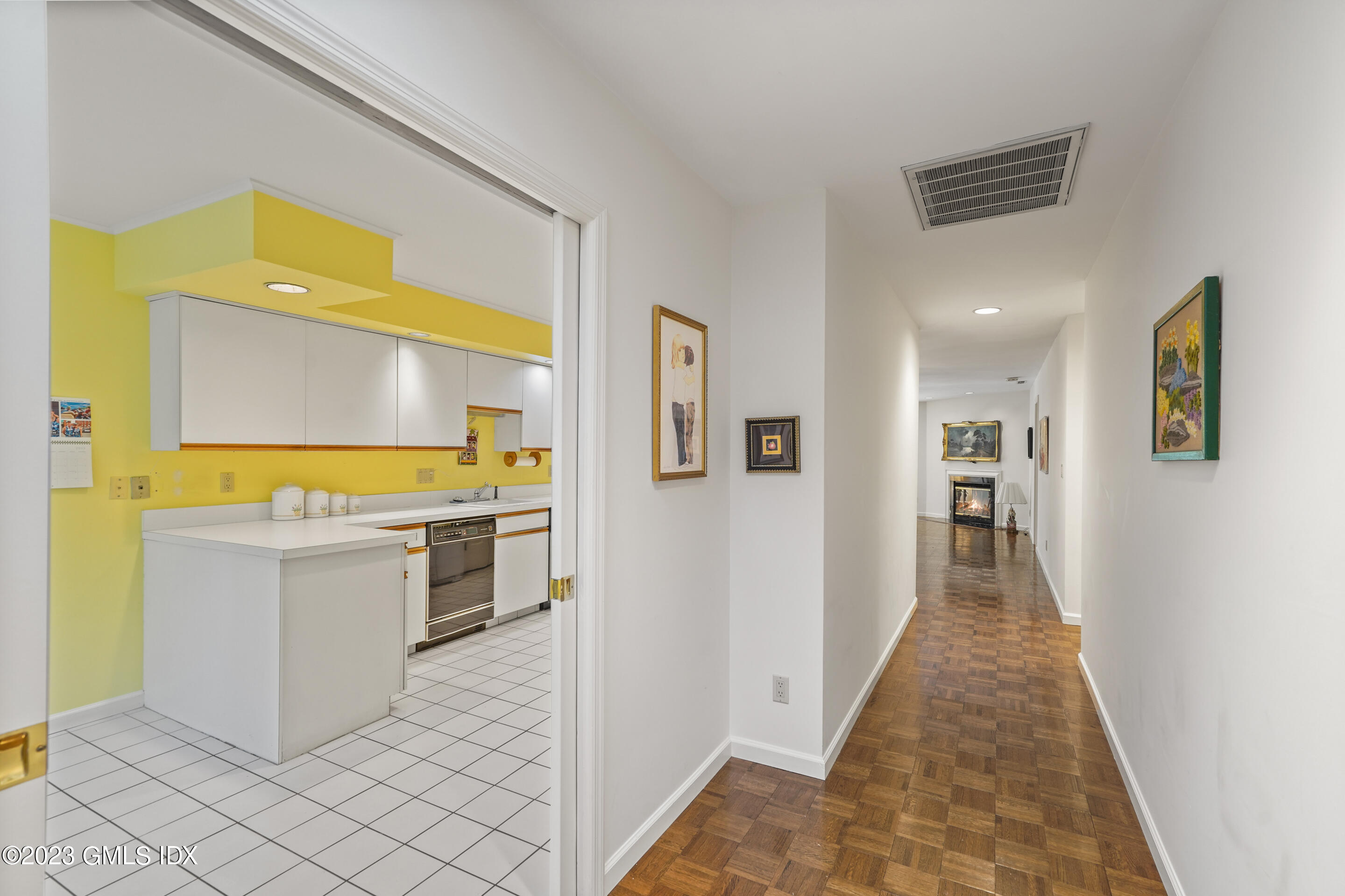 500 River Road, Unit 12 Cos Cob, CT 06807 - Photo 9 of 30 a view of a living room with a wooden floor