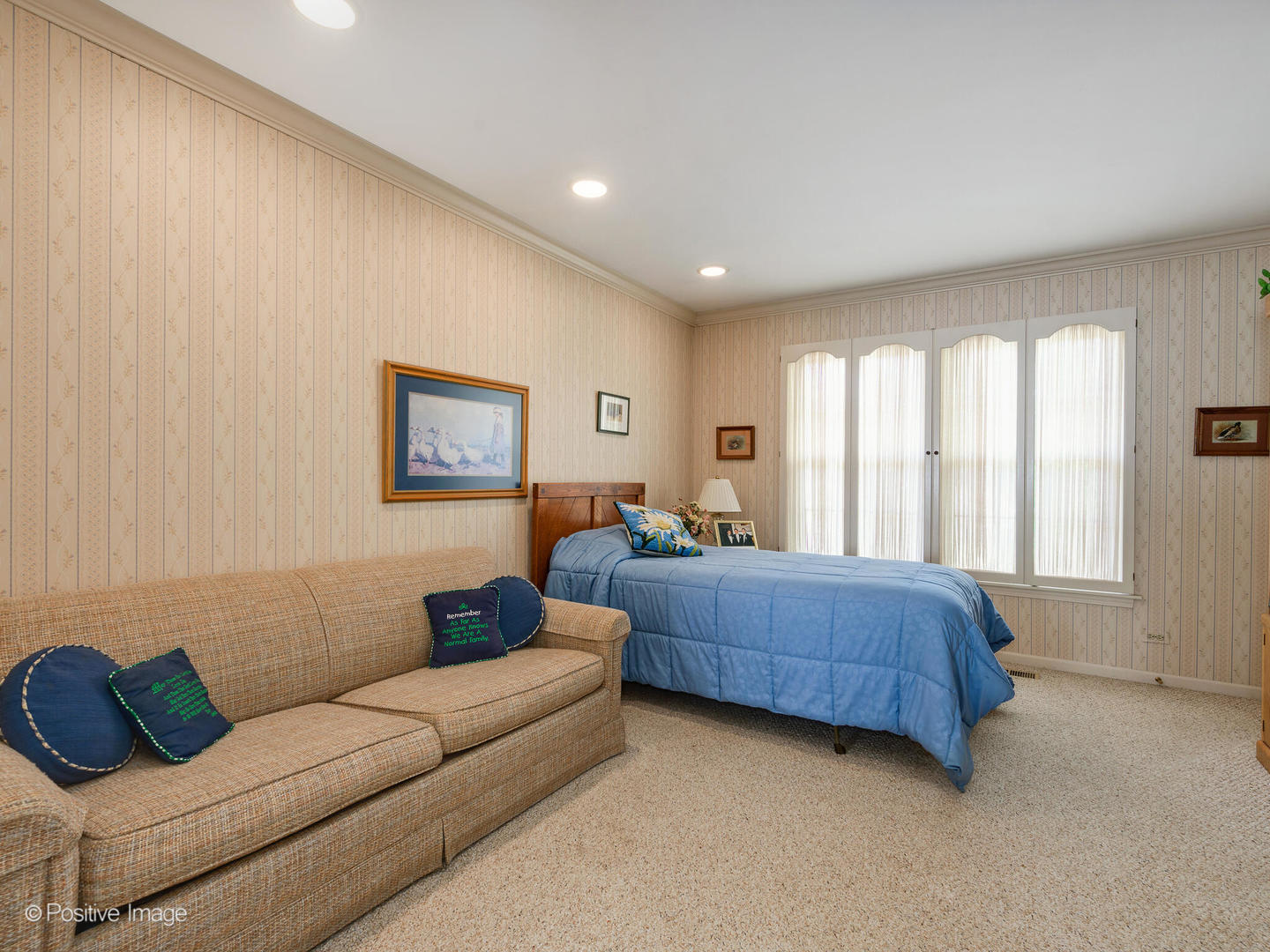 1107 Juniper Terrace Glenview, IL 60025 - Photo 14 of 30 a living room with a couch and a large window