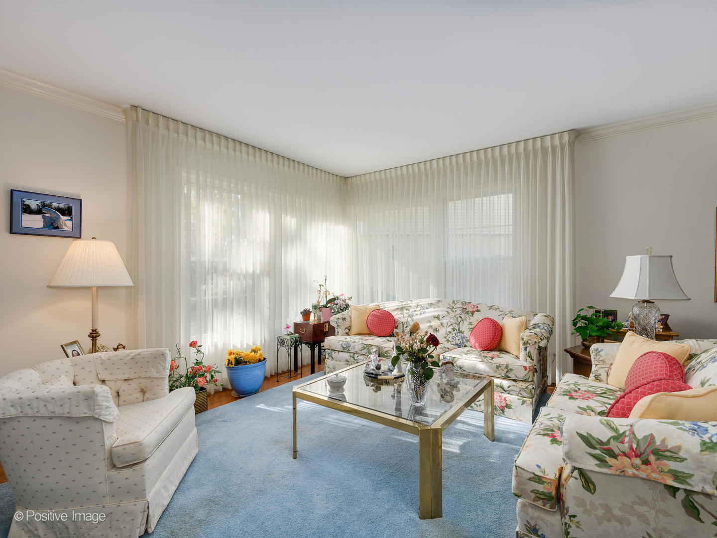 1107 Juniper Terrace Glenview, IL 60025 - Photo 2 of 30 a living room with furniture and a table