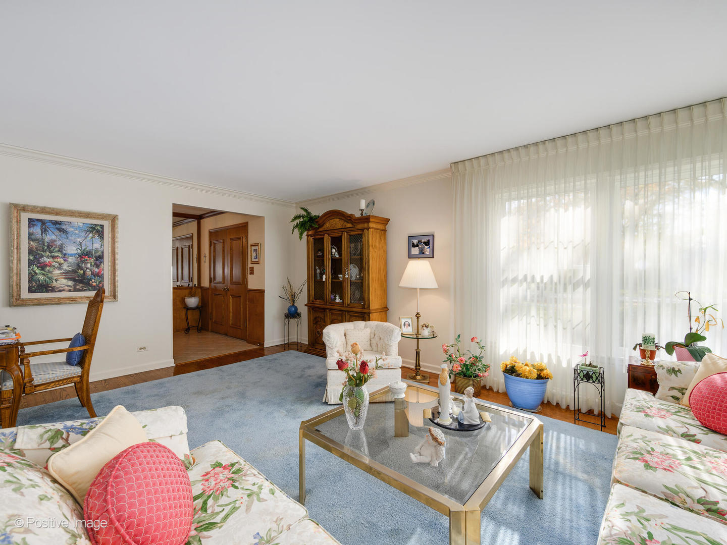 1107 Juniper Terrace Glenview, IL 60025 - Photo 5 of 30 a living room with furniture and wooden floor