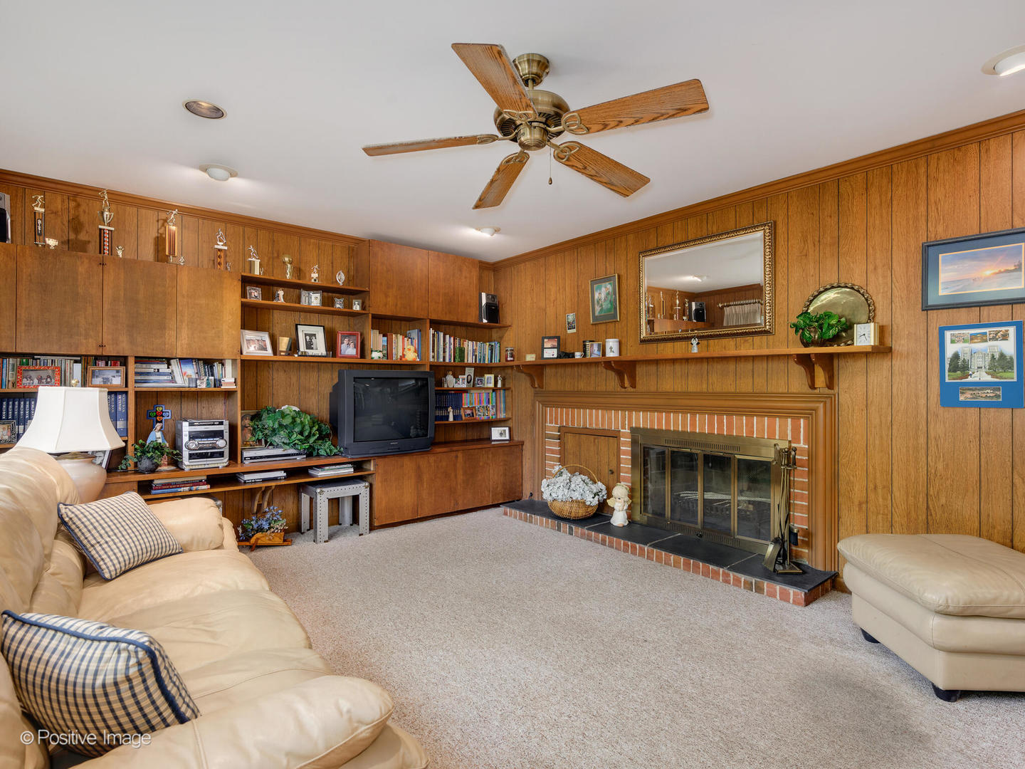 1107 Juniper Terrace Glenview, IL 60025 - Photo 8 of 30 a living room with furniture and a fireplace