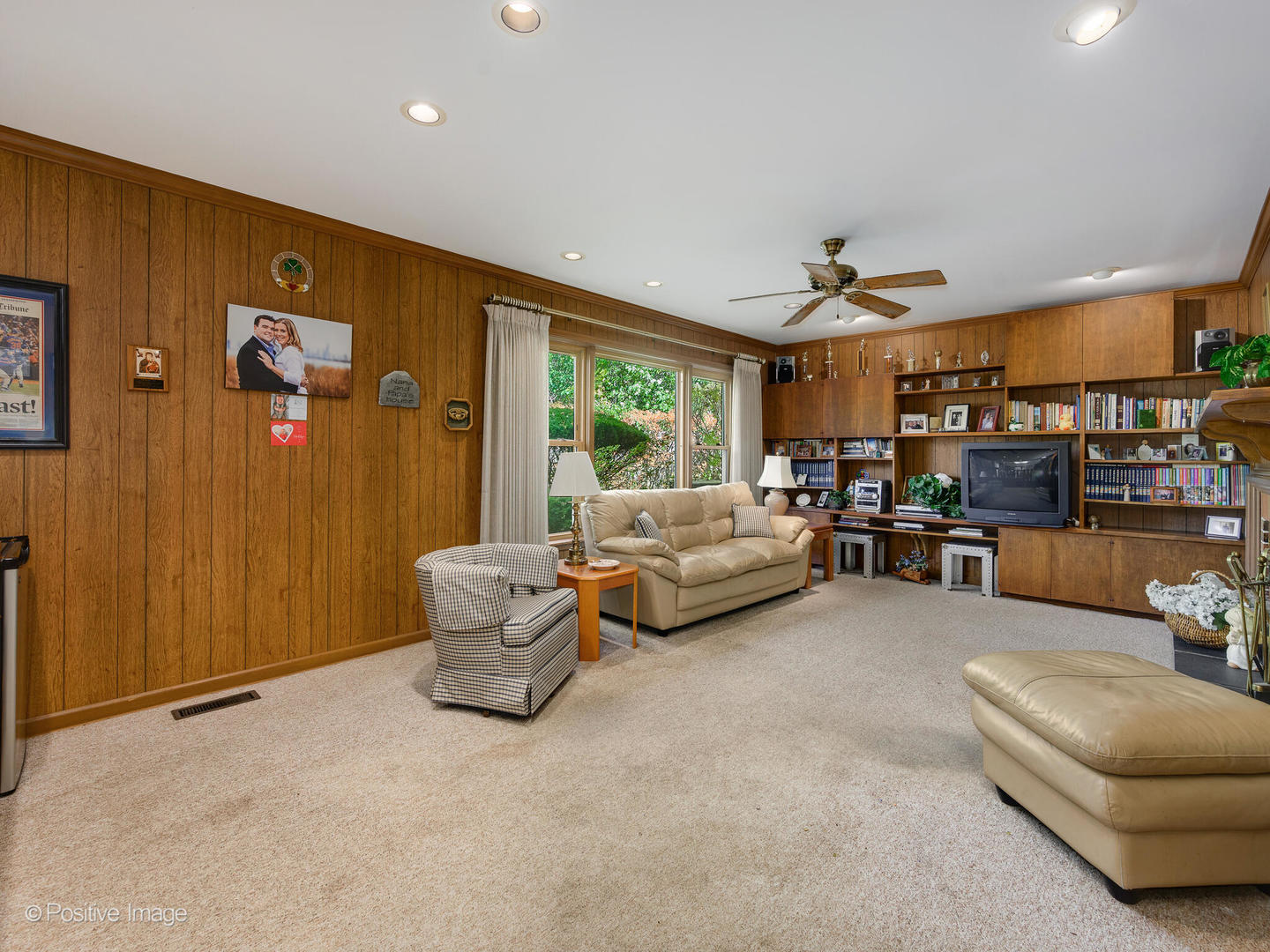 1107 Juniper Terrace Glenview, IL 60025 - Photo 9 of 30 a living room with furniture and a large window