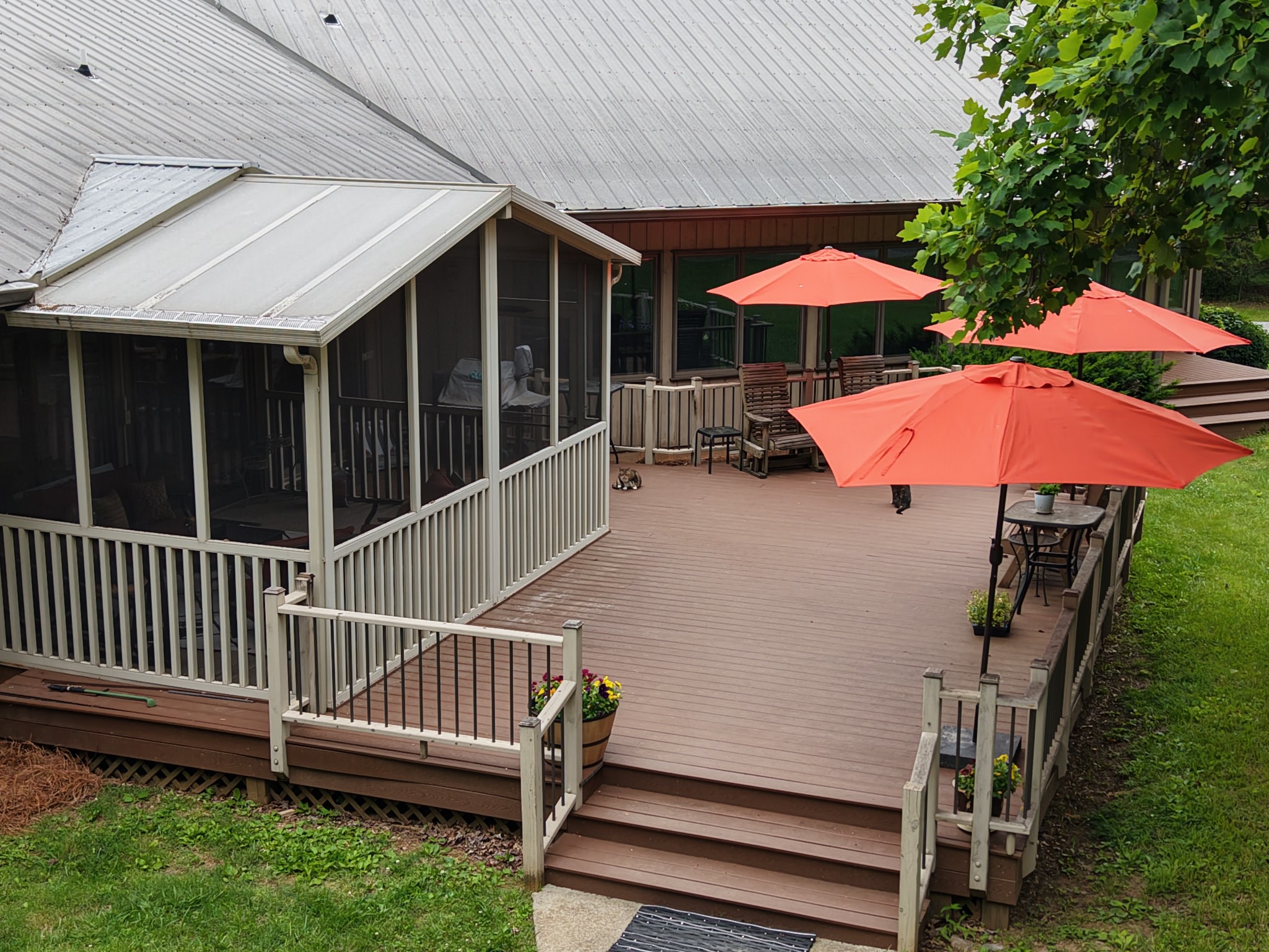 3 Millersburg Road Christiana, TN 37037 - Photo 49 of 60 a view of a patio with a table and chairs under an umbrella