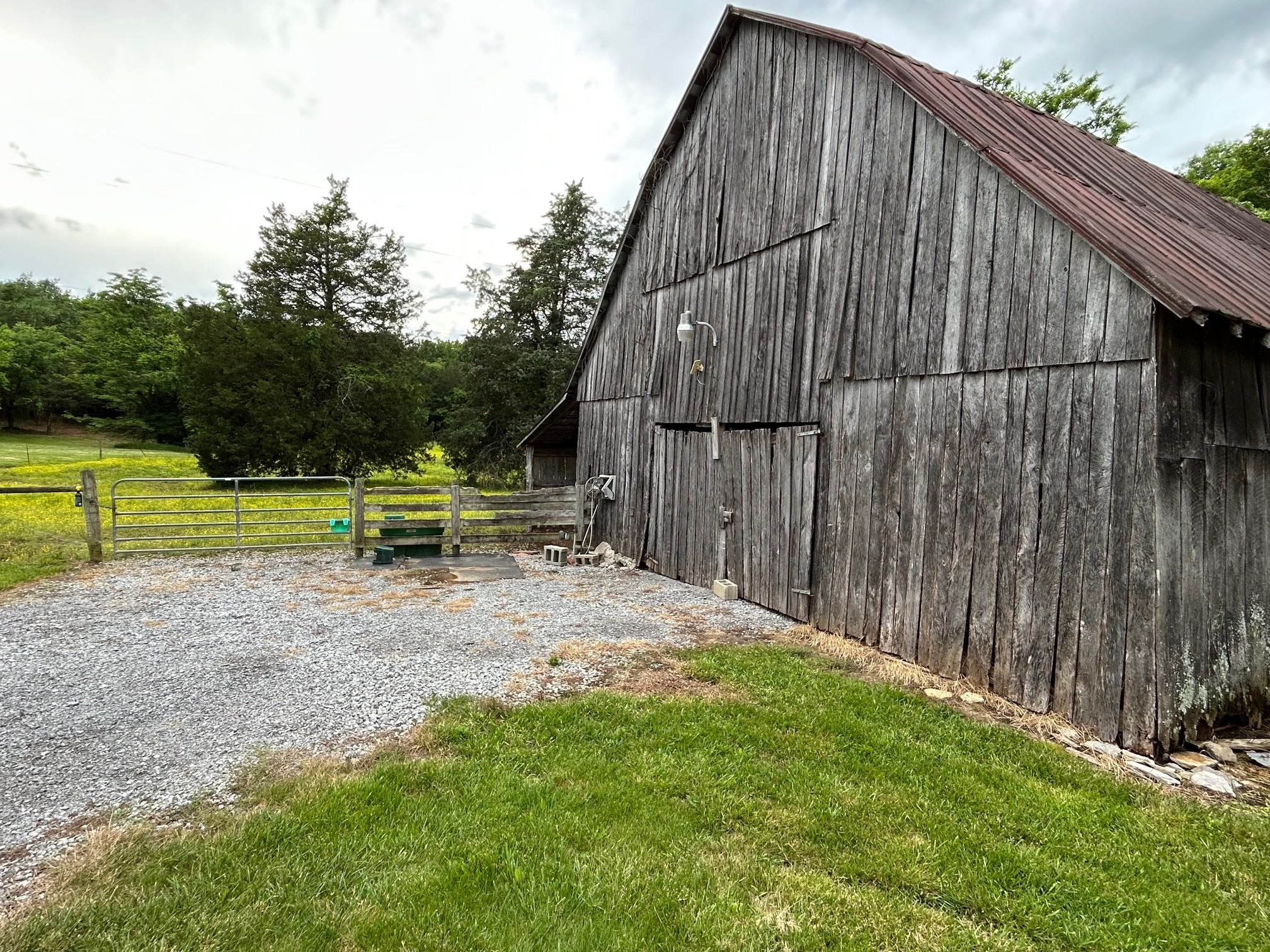 3 Millersburg Road Christiana, TN 37037 - Photo 50 of 60 a backyard of a house with wooden fence