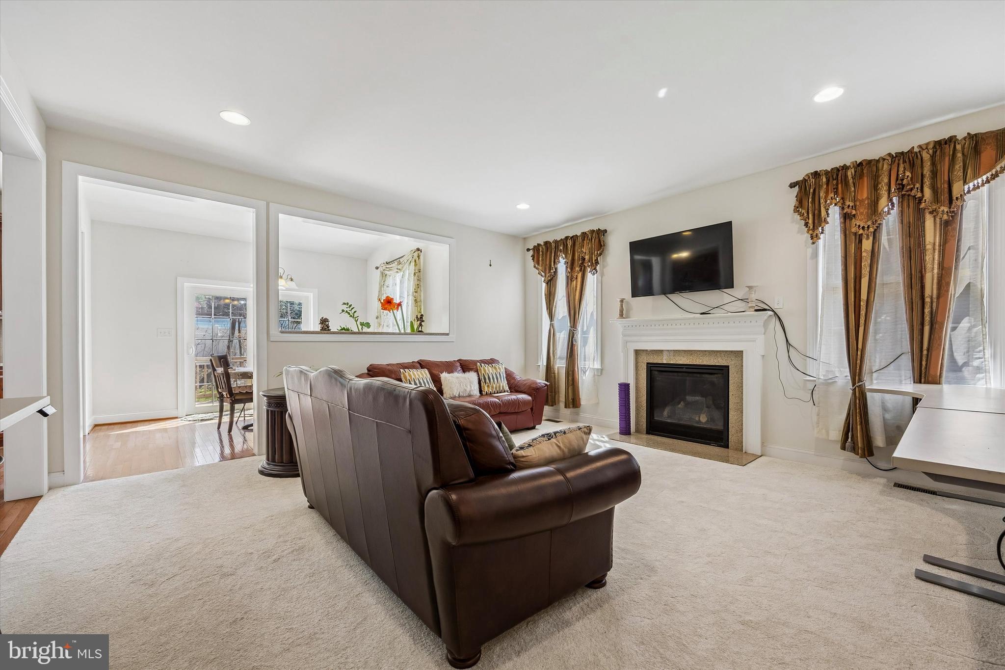 746 Upper Gulph Road Wayne, PA 19087 - Photo 12 of 34 Family room features new carpeting and fireplace
