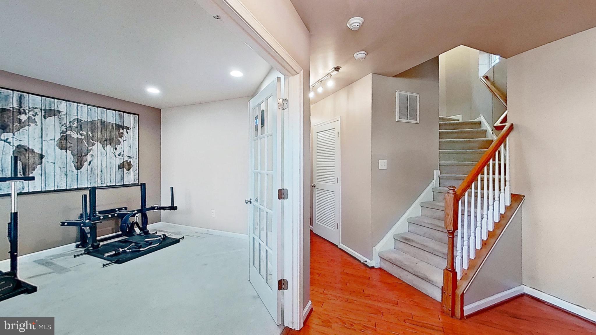 12 Fawn Court Delran, NJ 08075 - Photo 18 of 26 Spacious entryway with fitness area.