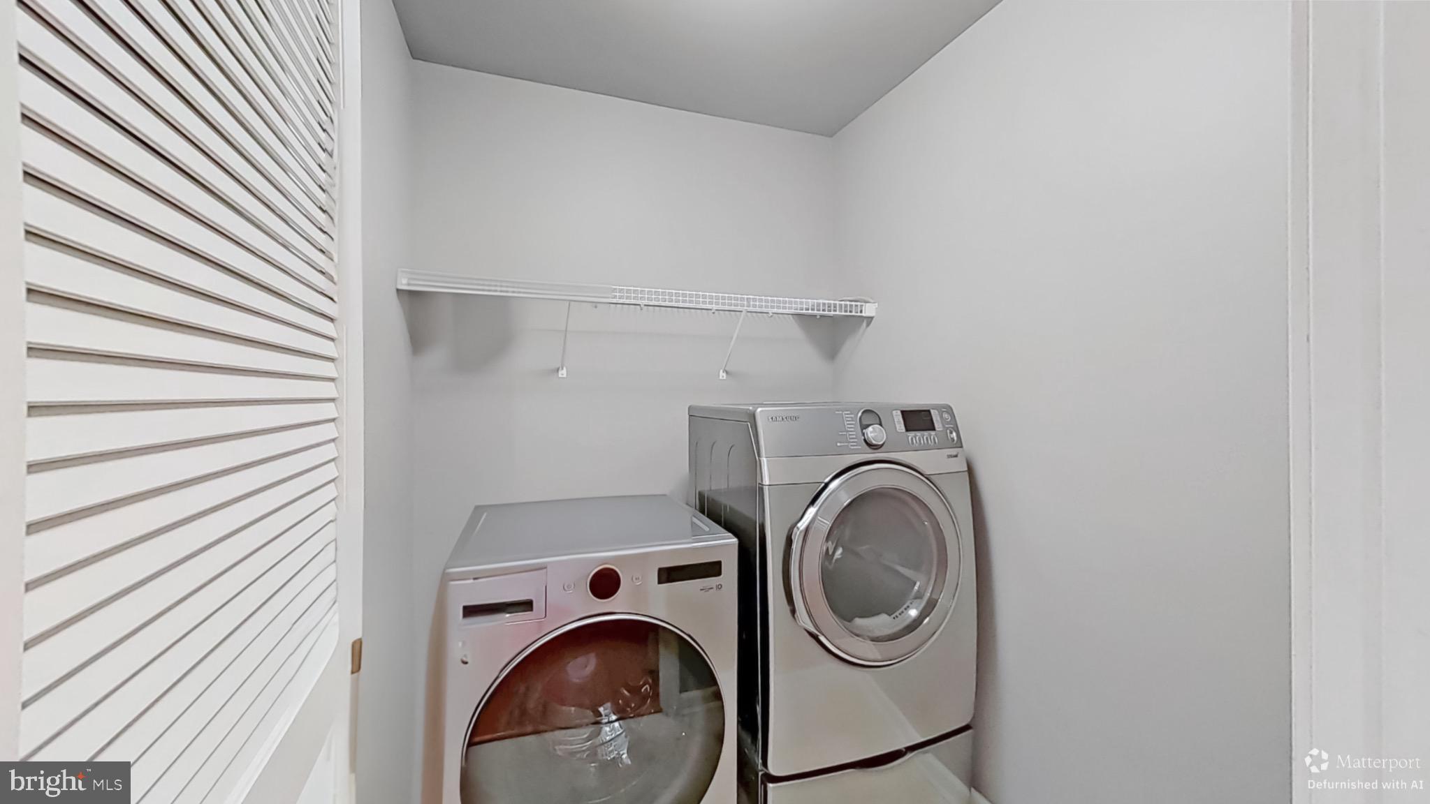 12 Fawn Court Delran, NJ 08075 - Photo 22 of 26 Modern laundry space with sleek appliances.