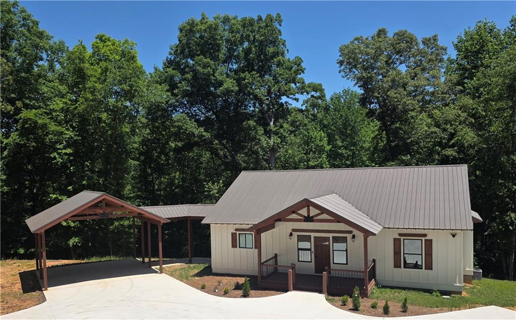 1217 Youngs Farm Road Cedartown, GA 30125 - Photo 2 of 29 a front view of a house with yard