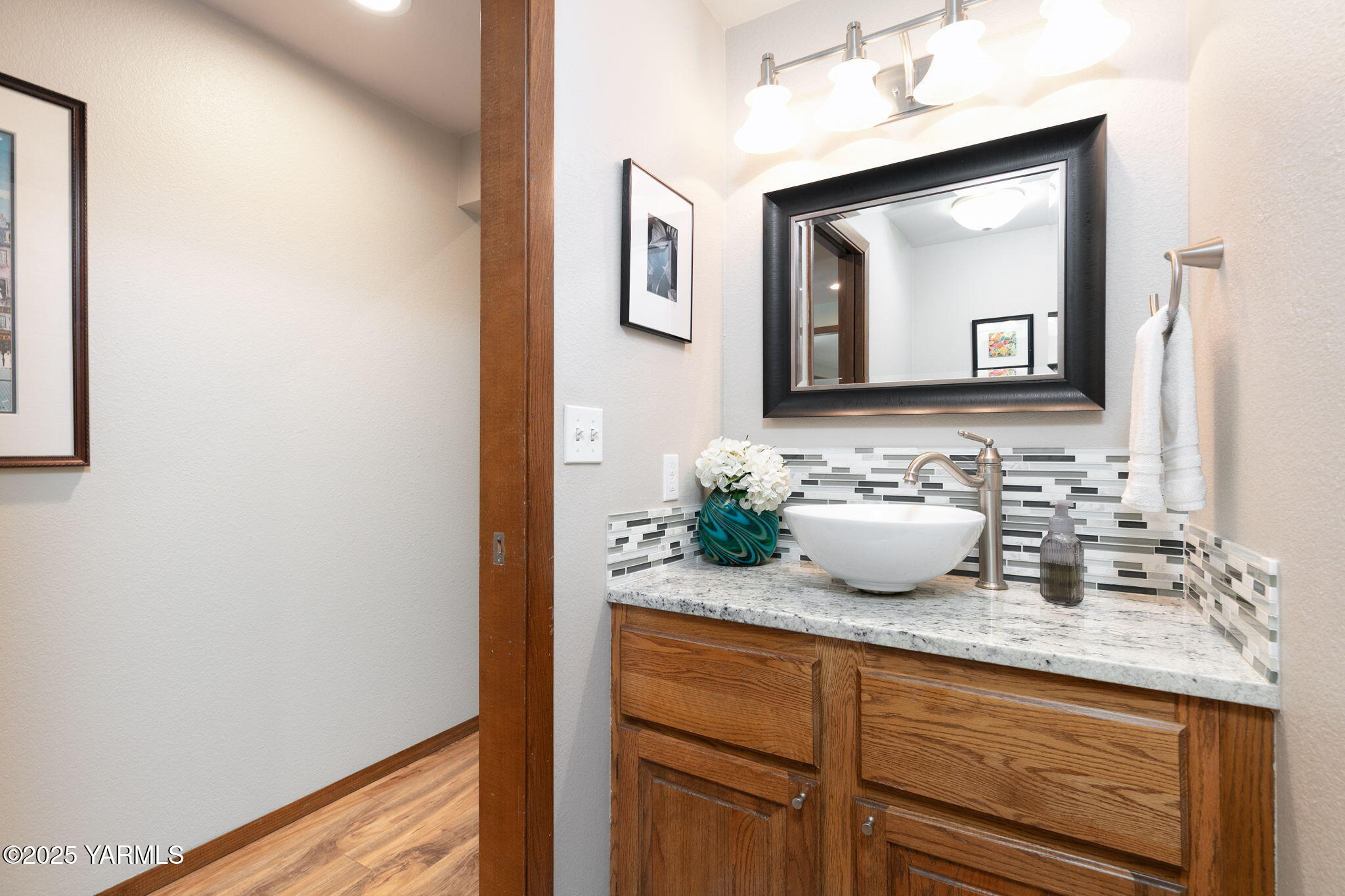9370 Bittner Road Yakima, WA 98901 - Photo 18 of 38 a bathroom with a granite countertop sink and a mirror
